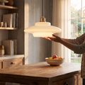 White glass pendant light with mid-century styling