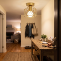 Modern gold ceiling light with geometric metal cage design
