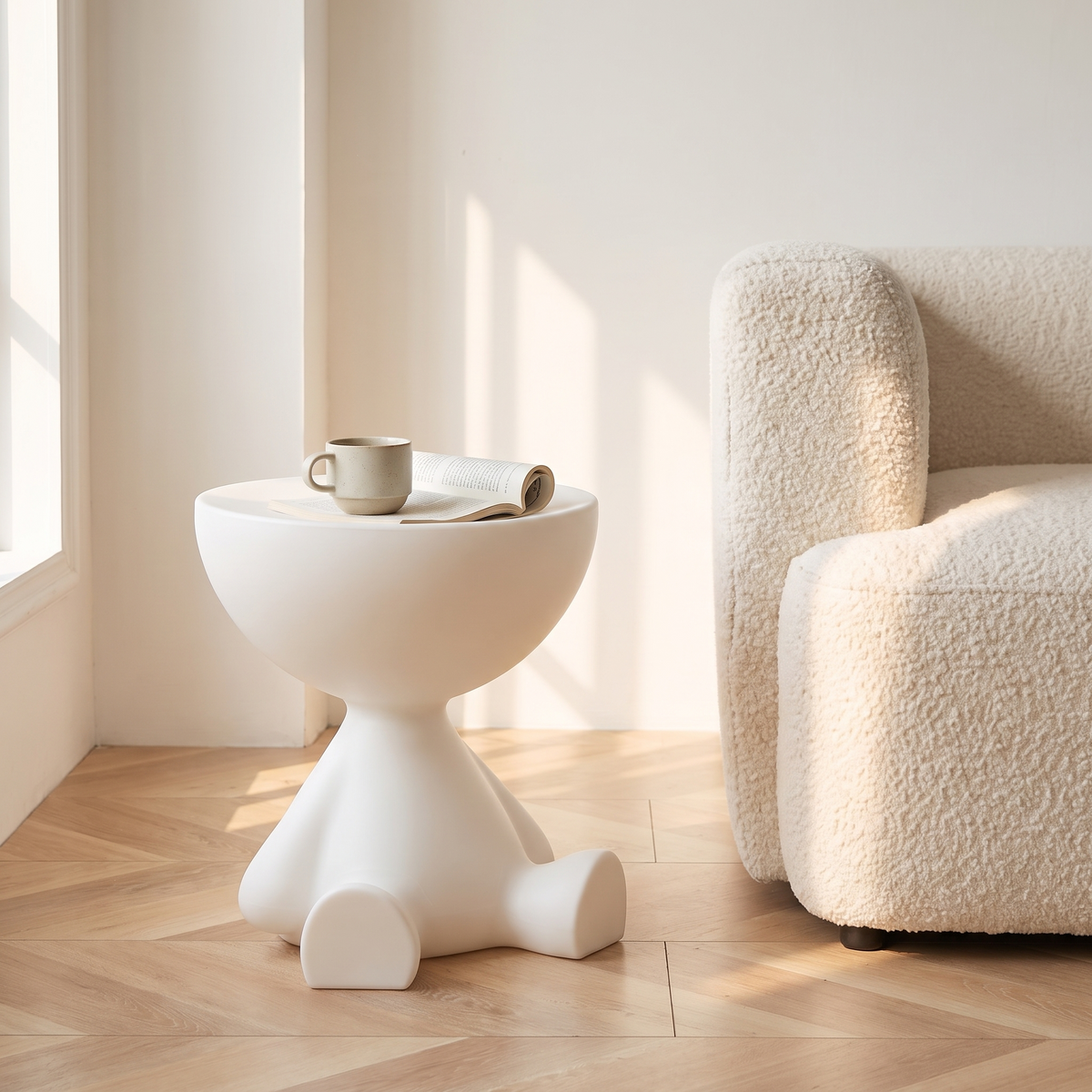 Mila Side Table in Milky White beside a cream sofa