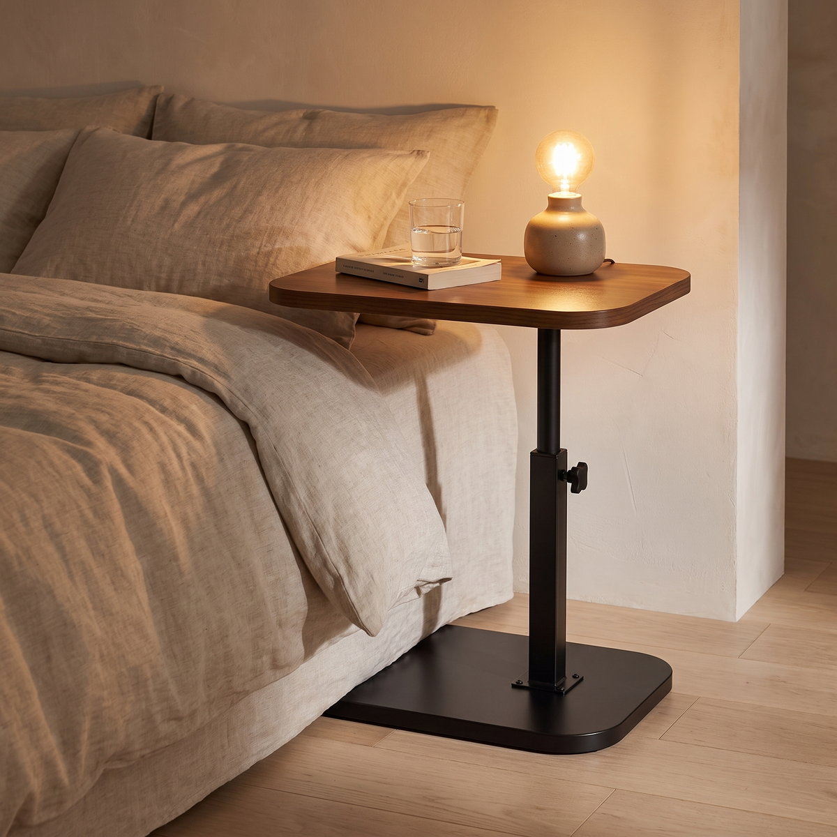 Ezra side table used as a bedside table with a lamp