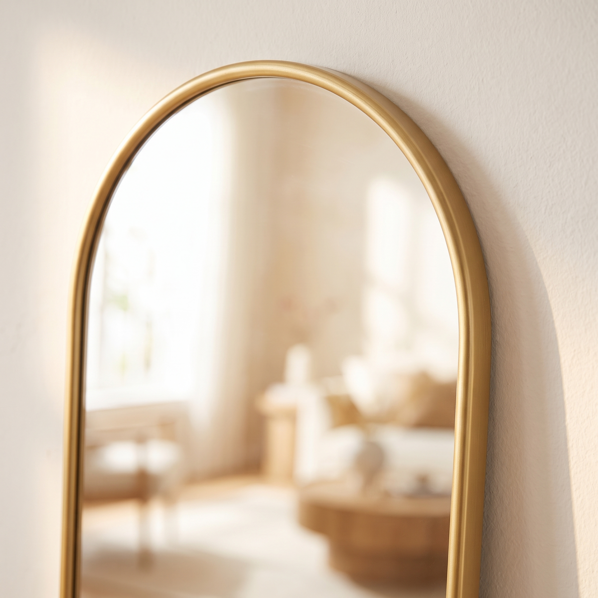 Close up of the oval top and gold frame