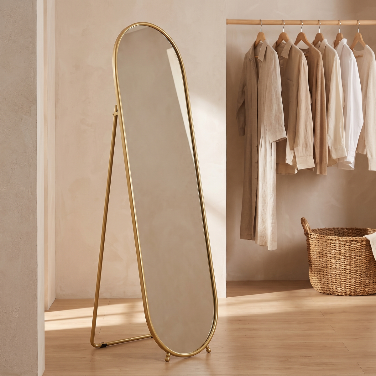Celia oval mirror on its stand, side view