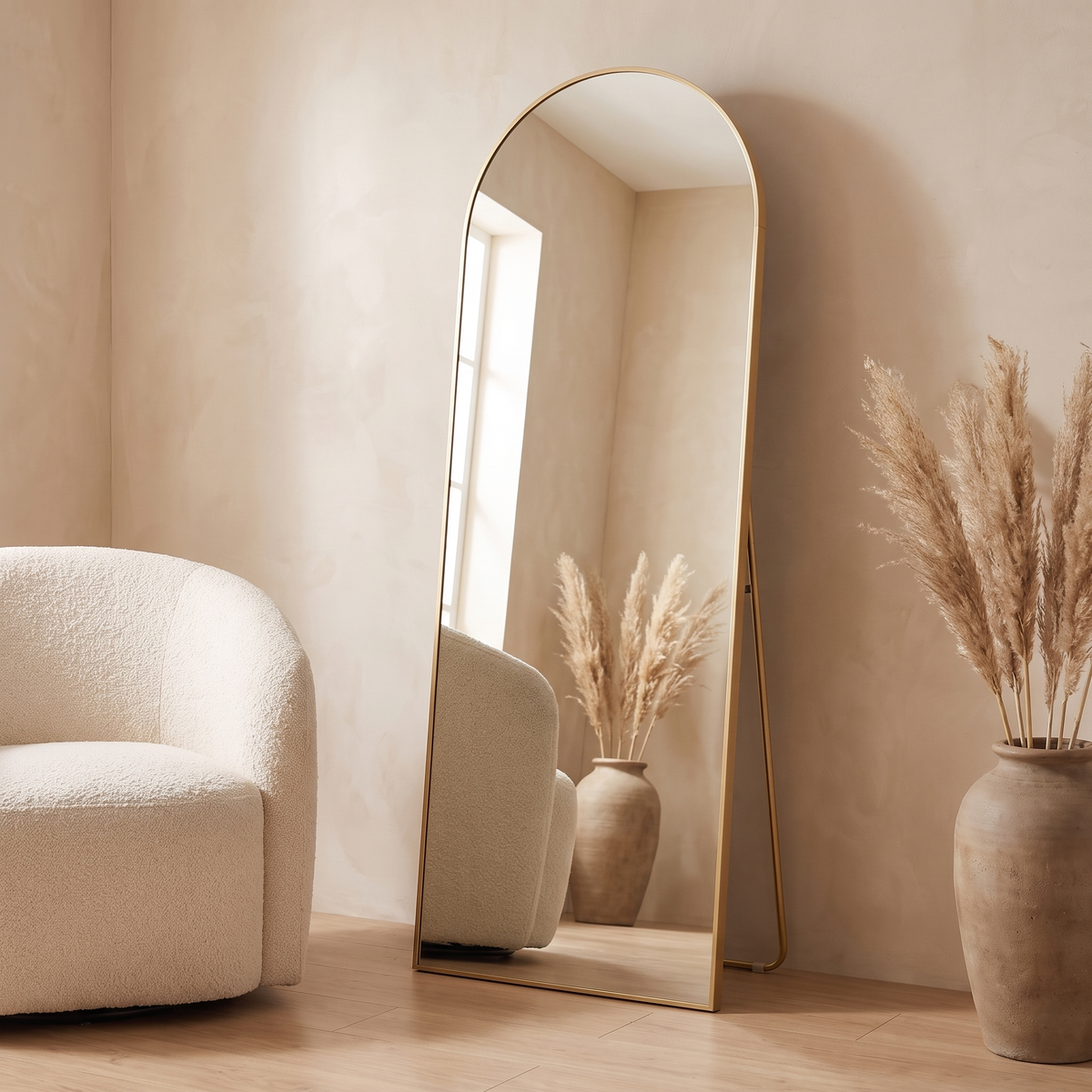 Aria gold arched full length mirror in a living room