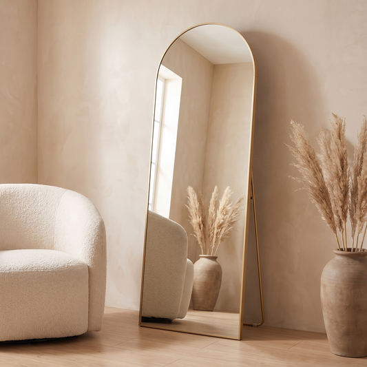 Aria gold arched full length mirror in a living room
