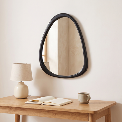 Isla black pebble wooden wall mirror above a desk