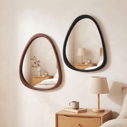 Isla pebble mirrors in brown and black side by side